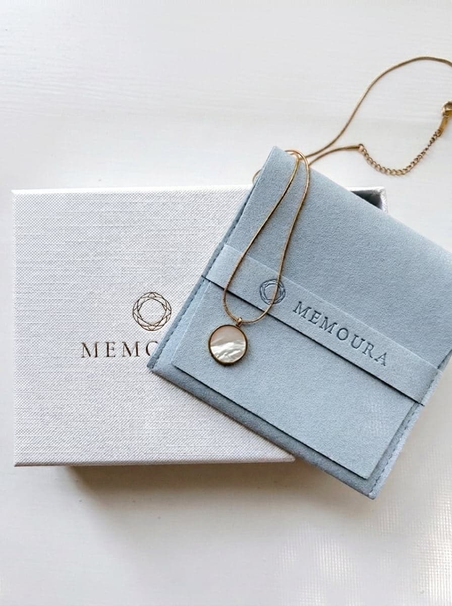 Gold Necklace on a box