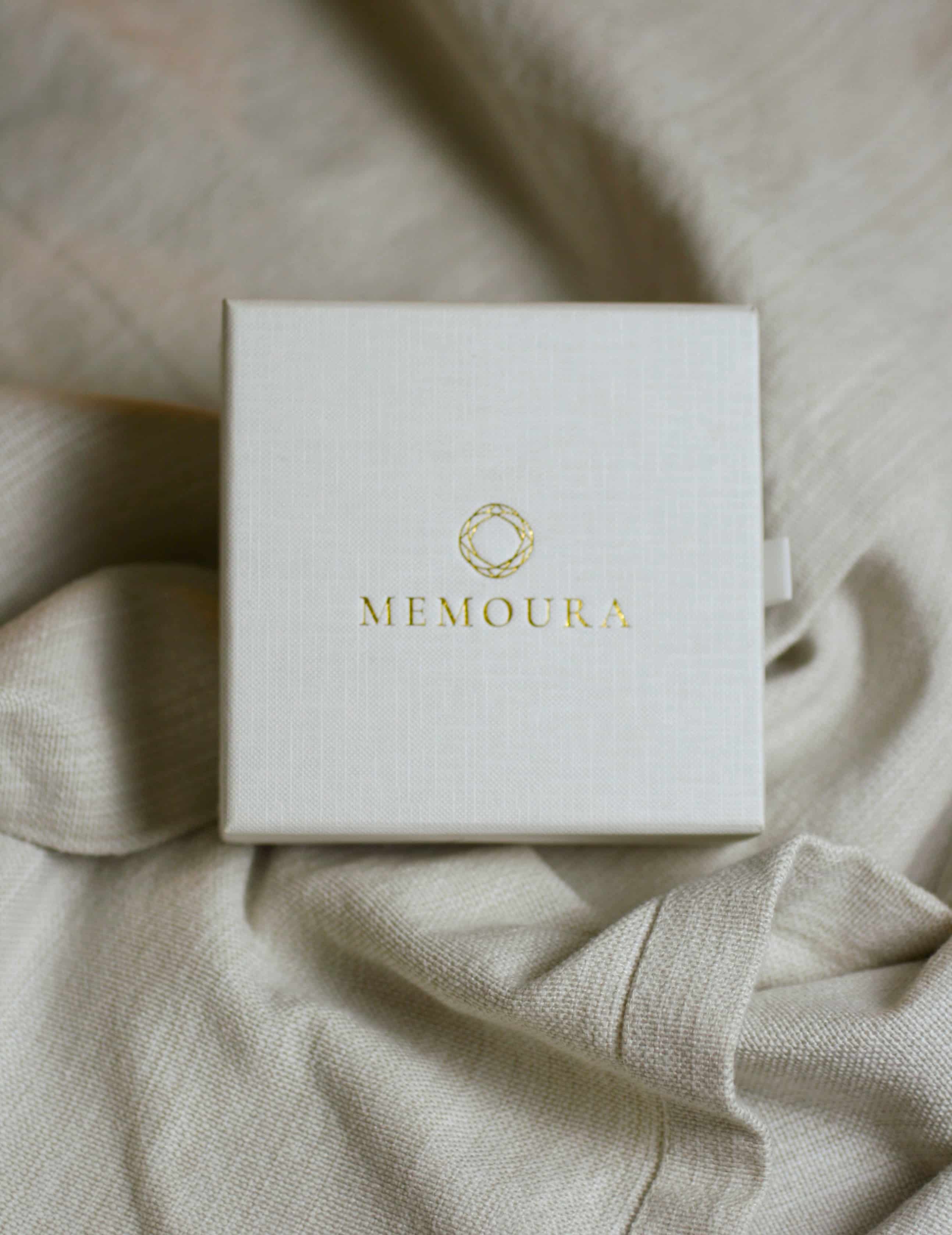 Memoura jewelry box on linen