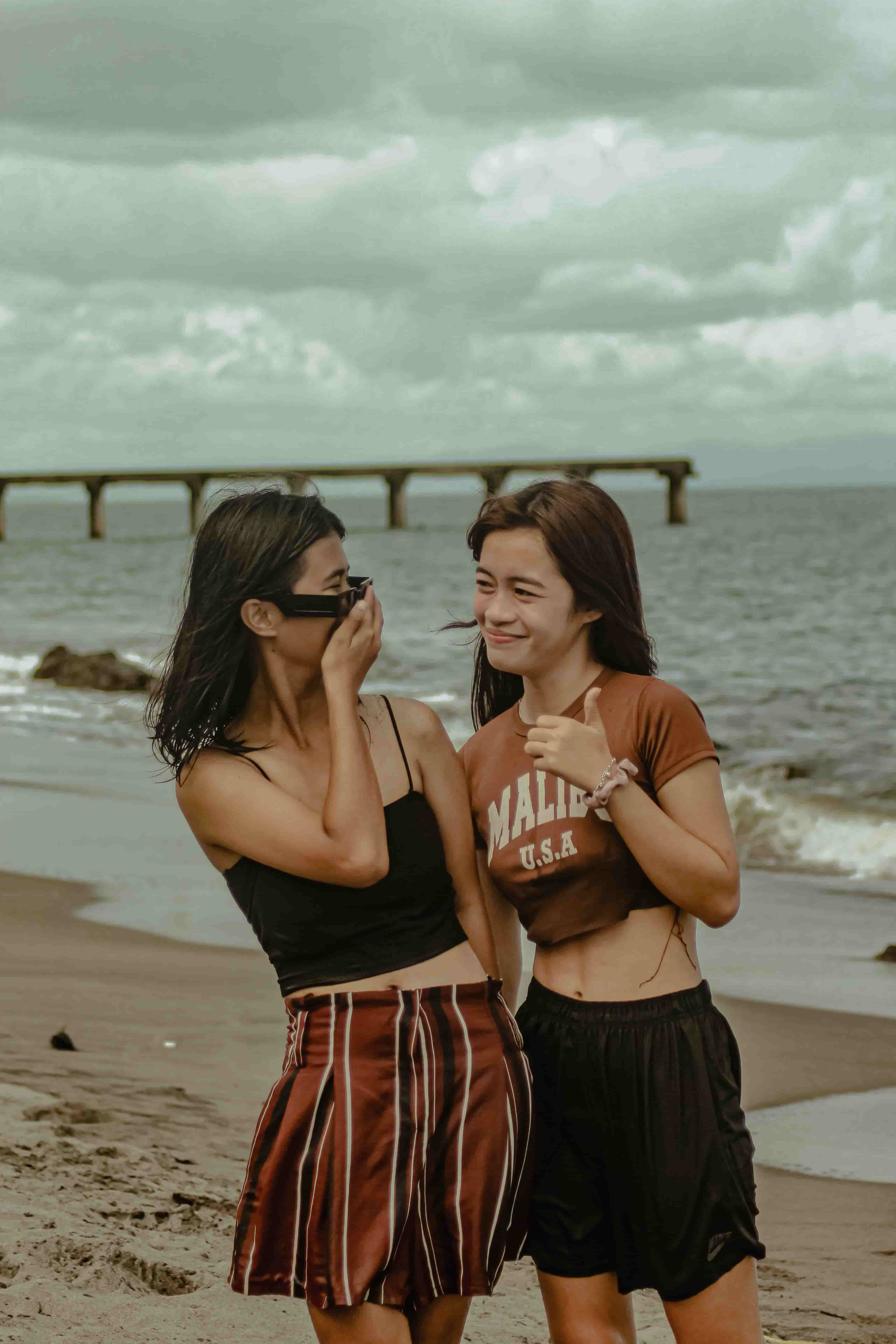 Two close friends hugging